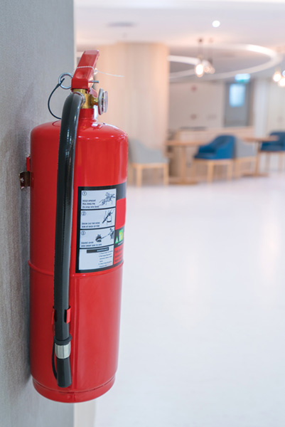 fire extinguisher mounted to wall